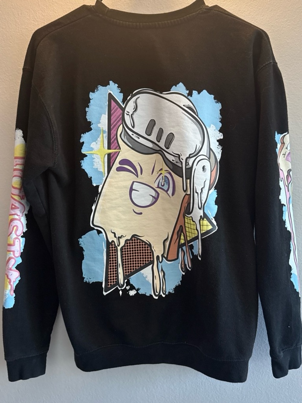 Source Unknown Black Crewneck Sweater with Colorful Cartoon Melt Print